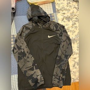 Good condition used men’s Nike running windbreaker size medium